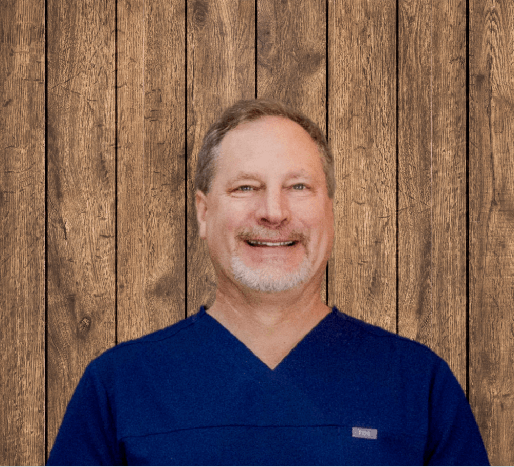 Portrait of Dr. Michael Saldino at Texas Foot & Ankle Institute, showcasing testimonials from his patients